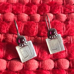 Silver earrings with purple stone